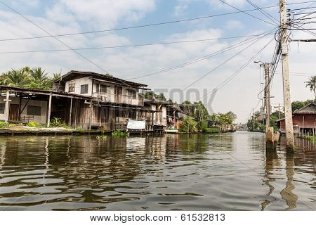 Slum on dirty canal in Thailand