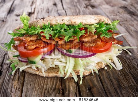 Doner Kebab - grilled meat, bread and vegetables