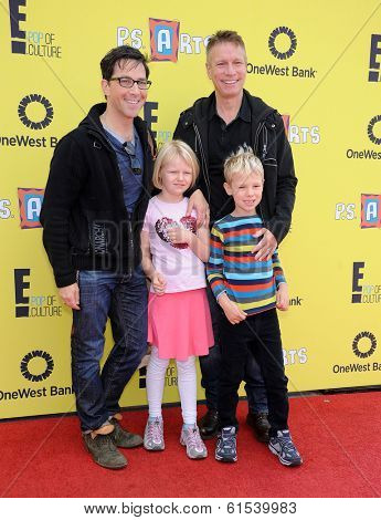 LOS ANGELES - NOV 17:  Dan Bucatinsky, Don Roos, Jonah Bucatinsky and Eliza Bucatinsky arrives to the P.S. Arts Express Yourself 2013  on November 17, 2013 in Santa Monica, CA                
