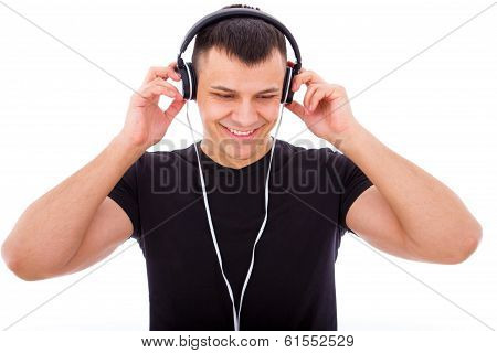 Handsome Boy Listening To Music With Headphones