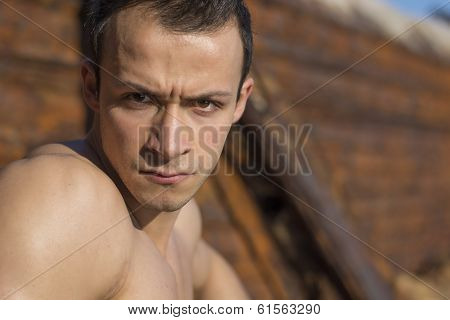Young Man With Stern Severe Eyes