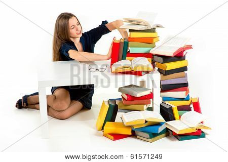 Girl Don't Want To Study And Learn, She Is Pushing Away From Herself A Stack Of Books
