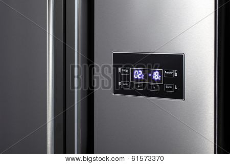 Detail of side-by-side steel refrigerator.