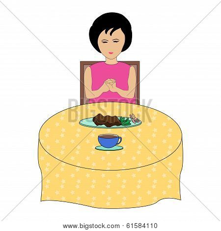Girl praying during lunch
