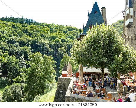 Tourists In Castle Eltz Above Mosel River, Germany