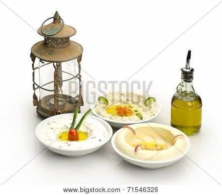 Arabic traditional Hummus , labneh and mtabbal with Ramadan Lamp