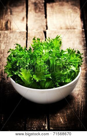 Fresh Green Lettuce  Salad On Blank Wooden Textured Backgroubd