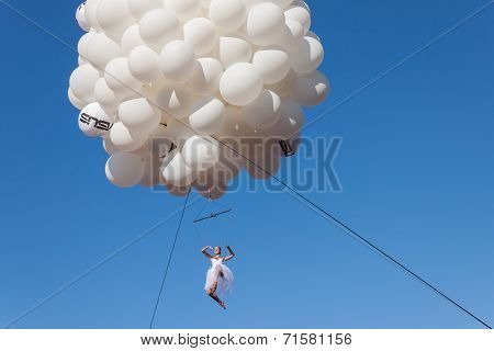 Dancer Performs Hanging From Balloons At The Color Run 2014 In Milan, Italy