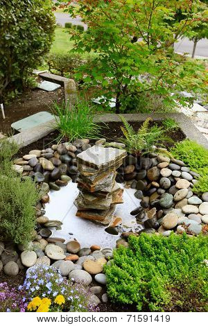 Ideas For Landscaping Home Garden. Fountain With Rocks
