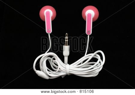 Rosa Earbuds schwarzen Hintergrund