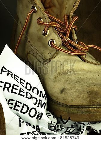 The Word Freedom Crushed By A Heavy, Old Military Boot.