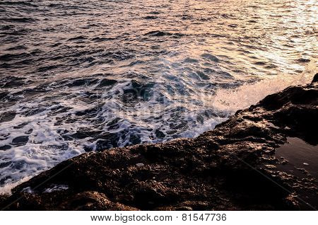 Strong Waves Crashing on the Volcanic Coast