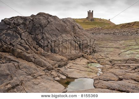 Geologie a Dunstanburgh Castle