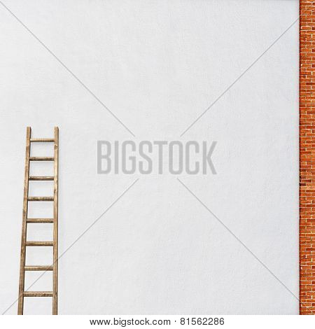white wall with a wooden ladder