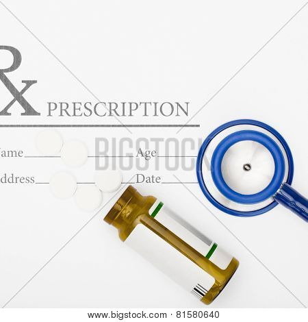 Medical Prescription Andl Pills And Stethoscope On Table