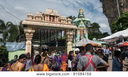KUALA LUMPUR, MALAYSIA - JANUARY 31, 2015: Hindu devotees visit the Sri Mahamarriamman temple built inside a limestone cave. Hundreds of thousands of devotees gather here for the Thaipusam prayers.