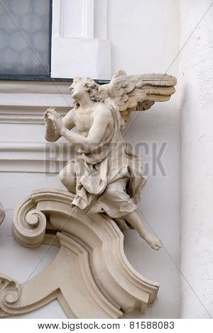 GRAZ, AUSTRIA - JANUARY 10, 2015: Angel on the portal of Mariahilf church in Graz, Styria, Austria on January 10, 2015.