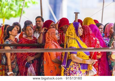 Indian Women Queue Up For Entrance To The Yearly Prozession