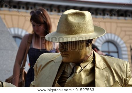 Street Performer, Living Statue In Golden Costume