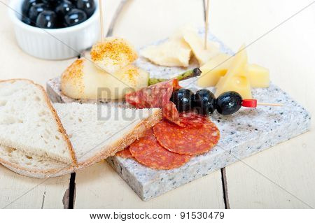 Mix Cold Cut On A Stone With Fresh Pears