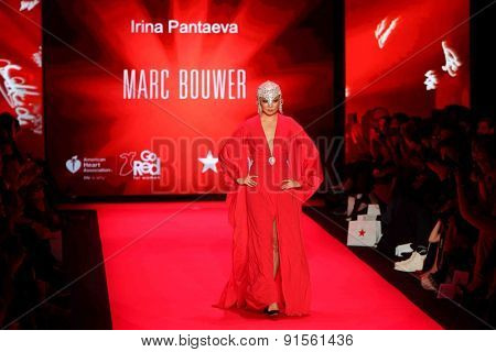 NEW YORK-FEB 12: Model Irina Pantaeva wears Marc Bouwer at Go Red for Women-The Heart Truth Red Dress Collection at Mercedes-Benz Fashion Week at Lincoln Center on February 12, 2015 in New York City.