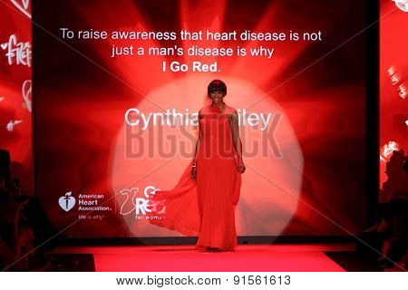 NEW YORK-FEB 12: Cynthia Bailey wears Jovan O'Connor at Go Red for Women-The Heart Truth Red Dress Collection at Mercedes-Benz Fashion Week at Lincoln Center on February 12, 2015 in New York City.