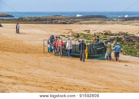 OUALIDIA, MOROCCO, APRIL 6, 2015: Fishermen prepare their boat to go fishing