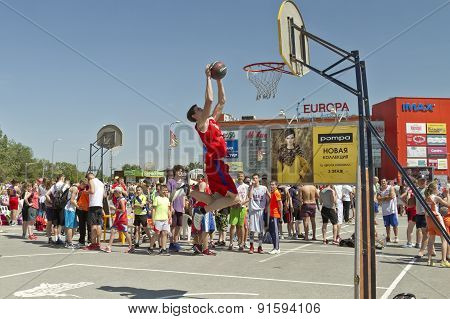 A Young Basketball Player Performs A Throw To The Slam Dunk Contest