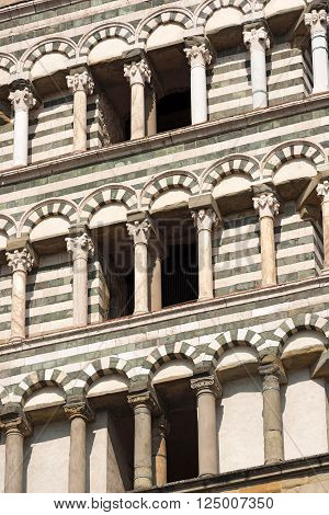 Detail of the bell tower of San Zeno (St. Zeno) Cathedral of Pistoia, Tuscany, Italy
