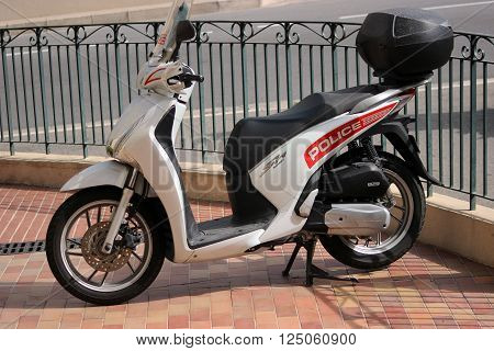 Monte-Carlo Monaco - April 6 2016: Honda SH 125i Motorbike Standing in Front of the Police Station. Motorcycles of Monaco Police Patrol on the City Street of Monte-Carlo