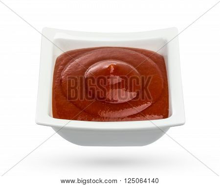 Bowl of ketchup or tomato sauce isolated on white background. With clipping path.
