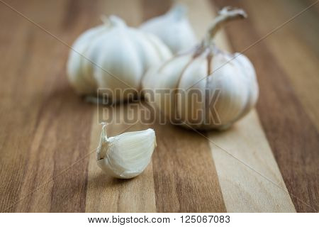 Organic garlic on wood background.vegetable raw food