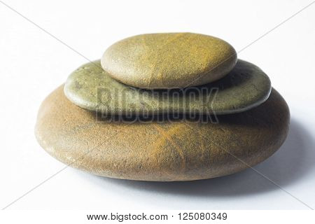 close up of Zen Stones stapled on white background