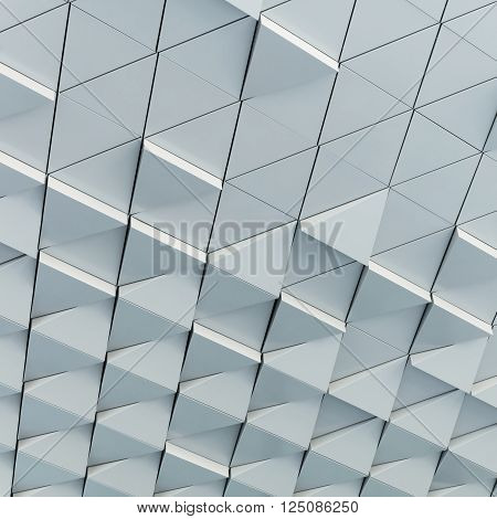 Abstract close-up view of modern aluminum ventilated facade of triangles