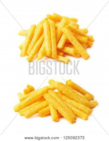 Pile of cheese puff stick corn snacks, composition isolated over the white background, set of two different foreshortenings