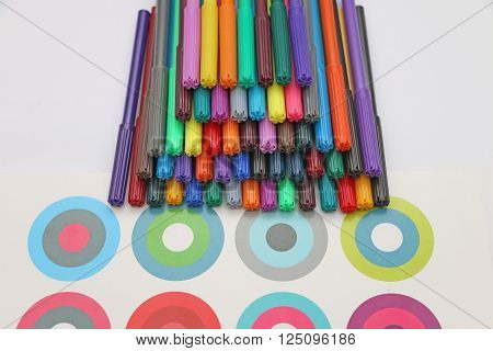 The composition of the selected color markers on a white background