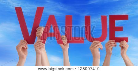 Many Caucasian People And Hands Holding Red Straight Letters Or Characters Building The English Word Value On Blue Sky