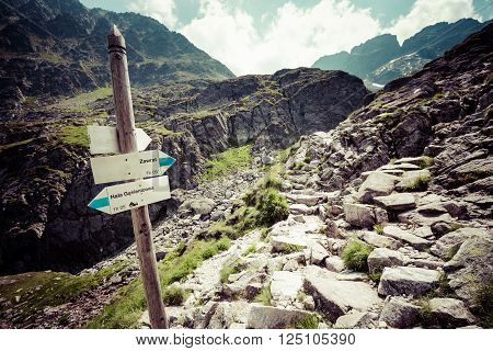 Direction sign on mountain trail High Tatras Poland