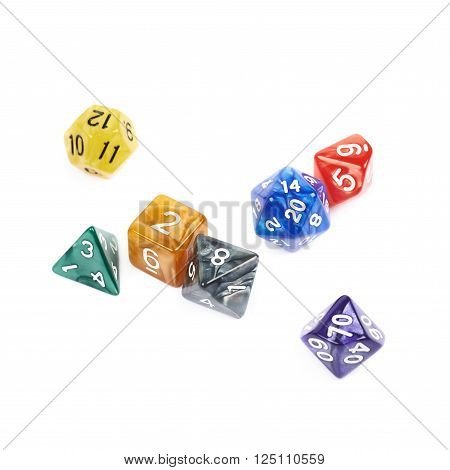 Pile of colorful roleplaying polyhedral dices isolated over the white background