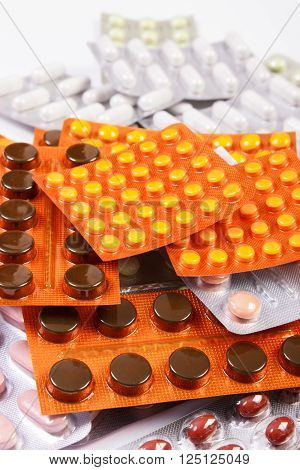 Blisters of medical pills capsules tablets or supplements for therapy concept of treatment and health care