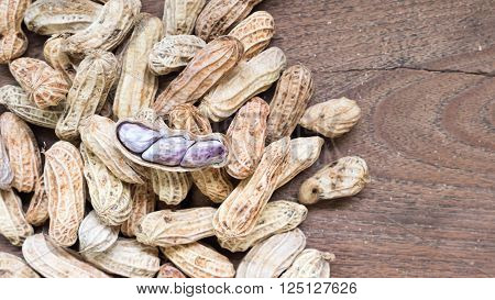 Boiled Peanuts On Wooden Table Background.