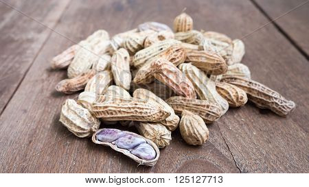 A pile of Boiled Peanuts on wooden table background.