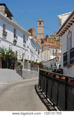 ALORA, SPAIN - JUNE 27, 2008 - View along a town street towards the church Alora Malaga Province Andalusia Spain Western Europe, June 27, 2008.