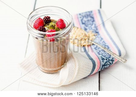 Oatmeal Chocolate Mousse With Berries And Pumpkin Seeds