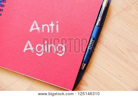 Anti aging text concept write on notebook