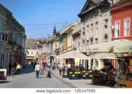 NOVI SAD, SERBIA - APRIL 03: Dunavska Street is one the oldest streets in center of Novi Sad, this street is a pedestrian zone, with pubs, restaurants, boutique... in Novi Sad, Serbia on April 03,2016