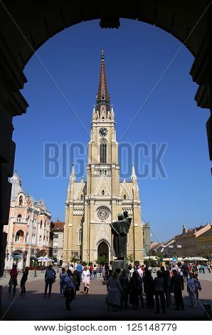 NOVI SAD SERBIA - APRIL 03: View on Catholic Cathedral from Liberty Square in Novi Sadwhich in this city keeps the summer music festival EXIT. Photographed the in Novi Sad Serbia on April 03 2016.