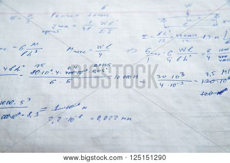 Squared sheet of paper filled with trigonometry math equations and formulas