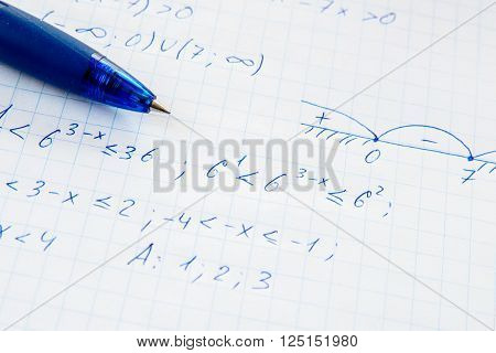 Squared sheet of paper filled with trigonometry math equations and formulas
