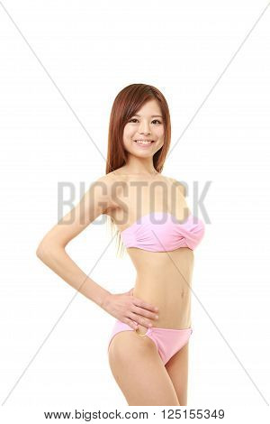 Japanese woman posing in a pink bikini